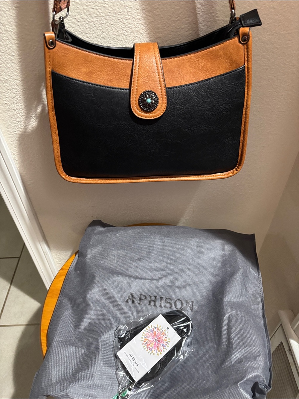 Aphison Black/Tan Crossbody Concho Purse